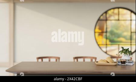 Uno spazio per esporre prodotti su un tavolo da pranzo in legno in una tradizionale sala da pranzo giapponese contemporanea presenta una finestra rotonda e una parete bianca. 3d. Foto Stock