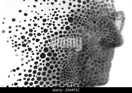 Un profilo astratto in bianco e nero di un uomo con occhiali Foto Stock