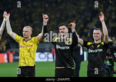 Marius Wolf del Borussia Dortmund, Niclas Fullkrug e Julian Ryerson celebrano la vittoria dopo il fischio finale nella semifinale di UEFA Champions League, partita di andata al Signal Iduna Park di Dortmund. Data foto: Mercoledì 1 maggio 2024. Foto Stock