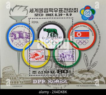 Foglio ricordo con francobolli cancellati stampati dalla Corea del Nord, che mostra Emblem, esposizione internazionale dei francobolli - Olymphilex-87, circa 1987. Foto Stock