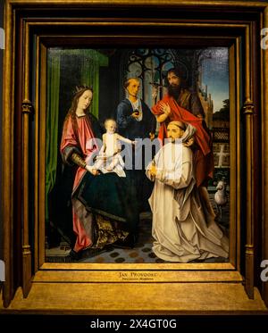 La Vergine col bambino in trono, con i Santi Girolamo e Giovanni Battista e un monaco certosino, Jan Provoost, Rijksmuseum, Amsterdam, Paesi Bassi. Foto Stock