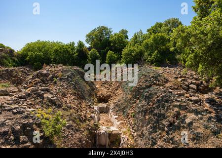 La fossa di Schliemann a Troia le antiche rovine della città a Canakkale in Turchia. I luoghi storici della Turchia immagine concettuale. Foto Stock