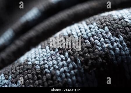 Primo piano del tessuto di lana di una giacca invernale con grembialatura blu Foto Stock