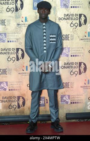 Seydou Sarr partecipa al photocall del 69° premio cinematografico italiano "David di Donatello" presso gli studi Cinecitta di Roma (Italia), 3 maggio 2024. Foto Stock