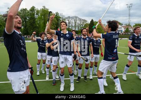 Bruxelles, Belgio. 5 maggio 2024. I giocatori di Gantoise festeggiano dopo aver vinto una partita di hockey tra il Royal Leopold Club e Gantoise, domenica 5 maggio 2024, a Bruxelles, una partita di ritorno nelle semifinali dei play-off del campionato belga di hockey di prima divisione. BELGA PHOTO VIRGINIE LEFOUR credito: Belga News Agency/Alamy Live News Foto Stock