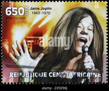 Pop star Janis Joplin in concerto su francobollo Foto Stock