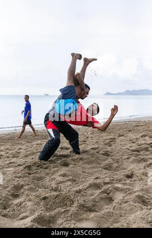 Allenamento alla seta Pencak, Dili Beach, Timor Est Foto Stock