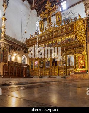 Israele, Betlemme. Altare all'interno della Chiesa della Natività, dove si crede che Gesù sia nato. Foto Stock