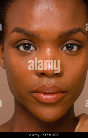 Primo piano della faccia di una donna Foto Stock