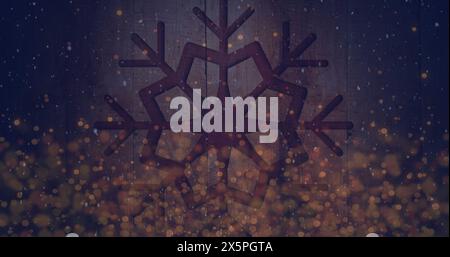 Immagine di neve che cade e macchie luminose sui fiocchi di neve su sfondo in legno Foto Stock