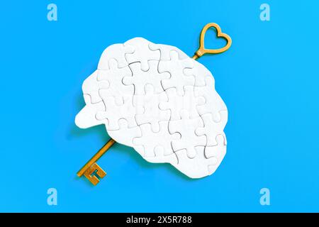 Chiave lunga inserita in un puzzle a forma di cervello umano isolato su sfondo blu, simboleggia lo sblocco di potenziale e conoscenza. Foto Stock