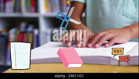 Immagine delle icone degli oggetti scolastici sopra il braille di lettura dello scolaro Foto Stock