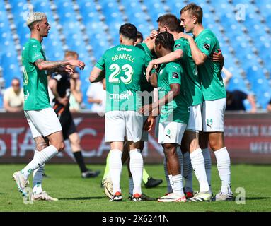 Deinze, Belgio. 12 maggio 2024. I giocatori di Lommel festeggiano dopo aver segnato durante una partita di calcio tra KMSK Deinze e Lommel SK, domenica 12 maggio 2024 a Deinze, seconda tappa della semifinale per la promozione al termine della seconda divisione del campionato belga 'Challenger Pro League' 2023-2024. BELGA FOTO DAVID PINTENS credito: Belga News Agency/Alamy Live News Foto Stock