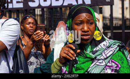 Attivisti di Londra per il Sudan marciarono nel centro di Londra chiedendo la fine della guerra civile in Sudan. Foto Stock