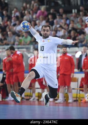 Vienna, Austria. 12 maggio 2024. Irakli Kbilashvili della Georgia spara durante la partita di qualificazione europea del Campionato del mondo maschile IHF 2025 tra Austria e Georgia a Vienna, Austria, il 12 maggio 2024. Credito: He Canling/Xinhua/Alamy Live News Foto Stock