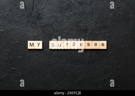 i miei scopi parola scritta su legno blocco. i miei scopi testo su cemento tabella per il vostro desing, concetto. Foto Stock