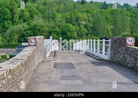 Il ponte a pedaggio a Whitney-on-Wye, oltre il fiume Wye, Whutney-0n-Wye, Herefordshire Foto Stock