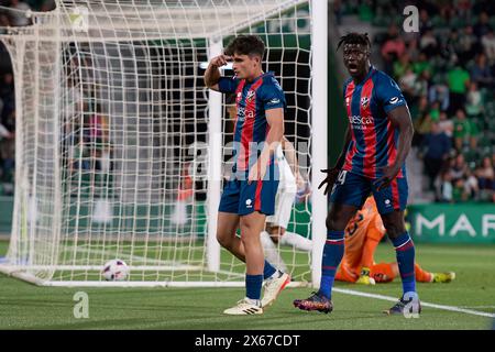 Elche, Spagna. 13 maggio 2024. ELCHE, SPAGNA - 12 MAGGIO: Javi Mier centrocampo centrale del SD Huesca festeggia dopo aver segnato il terzo gol della sua squadra durante il LaLiga Hypermotion match tra Elche CF e SD Huesca allo stadio Manuel Martinez Valero, il 12 maggio 2024 a Elche, Alicante, Spagna. (Foto di Francisco Macia/Photo Players Images) credito: Magara Press SL/Alamy Live News Foto Stock