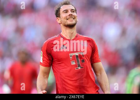 MONACO DI BAVIERA, GERMANIA - 12 MAGGIO: Leon Goretzka del Bayern Muenchen reagisce durante la partita di Bundesliga tra il Bayern München e il VfL Wolfsburg all'Allianz Arena il 12 maggio 2024 a Monaco di Baviera, Germania. © diebilderwelt / Alamy Stock Foto Stock