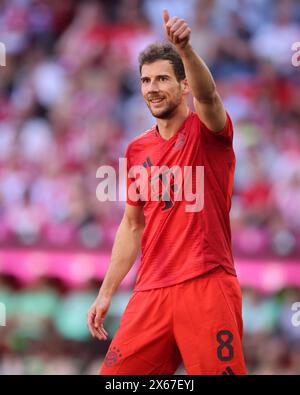 MONACO DI BAVIERA, GERMANIA - 12 MAGGIO: Leon Goretzka del Bayern Muenchen reagisce durante la partita di Bundesliga tra il Bayern München e il VfL Wolfsburg all'Allianz Arena il 12 maggio 2024 a Monaco di Baviera, Germania. © diebilderwelt / Alamy Stock Foto Stock