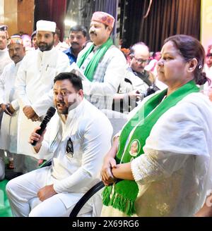 Patna, India. 13 maggio 2024. PATNA, INDIA - 13 MAGGIO: Leader della RJD Tejashwi Yadav con candidato del partito del collegio di Pataliputra Misa Bharti durante una manifestazione pubblica per le elezioni di Lok Sabha al S.K. Memorial Hall il 13 maggio 2024 a Patna, India. (Foto di Santosh Kumar/Hindustan Times/Sipa USA) credito: SIPA USA/Alamy Live News Foto Stock