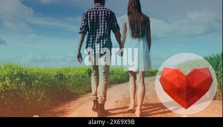 Immagine dell'icona del cuore sulla coppia caucasica che si tiene per mano Foto Stock