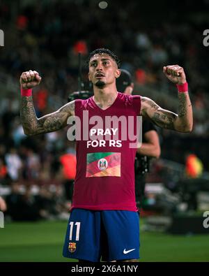 Barcellona, Spagna. 13 maggio 2024. Il Raphinha di Barcellona celebra i punti segnati durante la partita di calcio del campionato spagnolo (la Liga) tra FC Barcelona e Real Sociedad a Barcellona, in Spagna, il 13 maggio 2024. Crediti: Joan Gosa/Xinhua/Alamy Live News Foto Stock