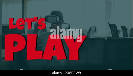 Immagine di Lets play su un uomo caucasico che indossa il visore vr Foto Stock
