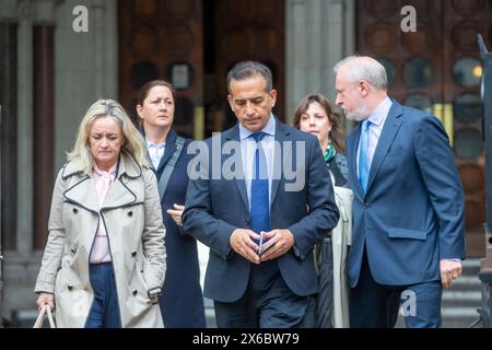 Londra, Inghilterra, Regno Unito. 14 maggio 2024. I genitori di Grace o'Malley-Kumar, del dottor SANJOY KUMAR e del dottor SINEAD o'MALLEY sono visti lasciare la Royal Courts of Justice nel centro di Londra dopo che la sentenza ha stabilito che la sentenza di Valdo Calocane non è "indebitamente indulgente”. Calocane è stato condannato ad un indefinito ordine ospedaliero per omicidio colposo a causa della diminuzione della responsabilità di Barnaby Webber, Grace o'Malley-Kumar e Ian Coates, e del tentato omicidio di altri tre, a Nottingham il 13 giugno dello scorso anno. Crediti: ZUMA Press, Inc./Alamy Live News Foto Stock