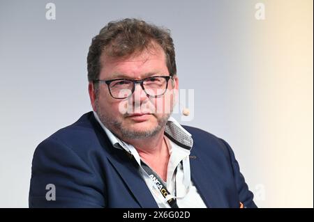 Colonia, Germania. 14 maggio 2024. Heinz Honemann, CEO vivax Net GmbH, parla ad Anagacom, la fiera congressuale leader in Europa per la banda larga, la televisione e il web. Crediti: Horst Galuschka/dpa/Alamy Live News Foto Stock