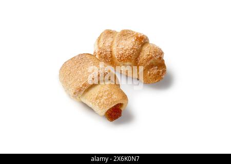 Due mini deviatoi di pasta sfoglia spolverata con zucchero e confiture di mele Foto Stock