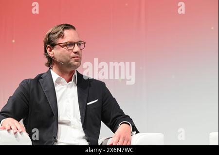 Colonia, Germania. 14 maggio 2024. Michael Jungwirth, Director Public Policy, Vodafone Group & Member of the Management Board, Vodafone Germany parla ad Anagacom, la fiera leader in Europa per il settore della banda larga, della televisione e online. Crediti: Horst Galuschka/dpa/Alamy Live News Foto Stock