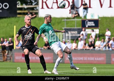 Deinze, Belgio. 12 maggio 2024. Denis Prychynenko (13) di KMSK Deinze e Sales Arthur De Oliveira (19) di Lommel nella foto di una partita di calcio tra KMSK Deinze e SK Lommel nelle finali dei play-off per la promozione - seconda tappa nella stagione Challenger Pro League 2023-2024, lunedì 12 maggio 2024 a Deinze, Belgio . Crediti: Sportpix/Alamy Live News Foto Stock