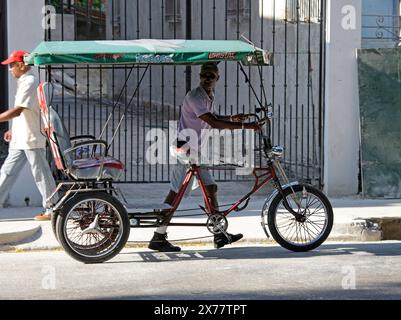 Taxi a pedale, Havana, Cuba, Caraibi. Foto Stock