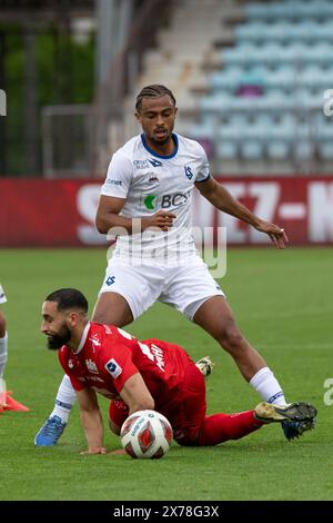 Losanna, Svizzera. 18 maggio 2024: Antoine Bernede (al centro) del Losanna-Sport #24 tacles Elies Mahmoud (al centro) dello Stade-Lausanne-Ouchy #28uring FC Stade Lausanne Ouchy vs FC Lausanne Sport allo Stadio Olimpico Pontaise di Losanna. Crediti: Patrick Dancel/Alamy Live News Foto Stock