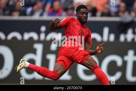 SINSHEIM, GERMANIA - 18 MAGGIO: Alphonso Davies del Bayern Muenchen in azione durante la partita di Bundesliga tra TSG Hoffenheim e FC Bayern München al PreZero-Arena il 18 maggio 2024 a Sinsheim, Germania. © diebilderwelt / Alamy Stock Foto Stock