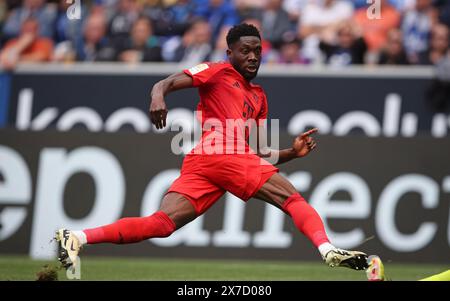 SINSHEIM, GERMANIA - 18 MAGGIO: Alphonso Davies del Bayern Muenchen in azione durante la partita di Bundesliga tra TSG Hoffenheim e FC Bayern München al PreZero-Arena il 18 maggio 2024 a Sinsheim, Germania. © diebilderwelt / Alamy Stock Foto Stock