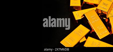 Primo piano Gold Bars su sfondo nero, concetto di successo nel business e nella finanza Foto Stock