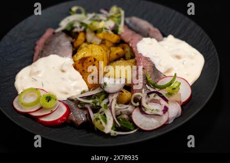 matjes alle erbe fresche con patate fritte e salsa Sylt Foto Stock