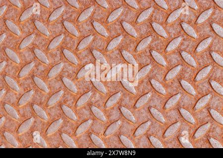 Fondo in metallo arrugginito con struttura a motivi geometrici Foto Stock