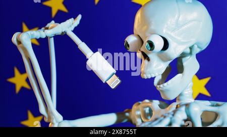 Il giocattolo scheletrico che regge un cavo USB Lightning simboleggia la morte di questo connettore. Il concetto del quadro illustra la decisione tanto attesa dell'Unione europea in materia Foto Stock