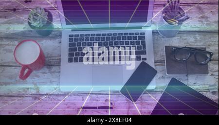 Immagine di quadrati che si spostano sulla scrivania con dispositivi tecnologici in ufficio Foto Stock