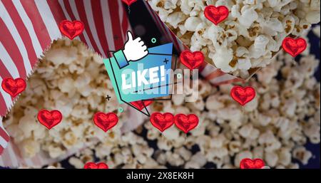 Immagine di testo simile e icona su cuori rossi e popcorn Foto Stock