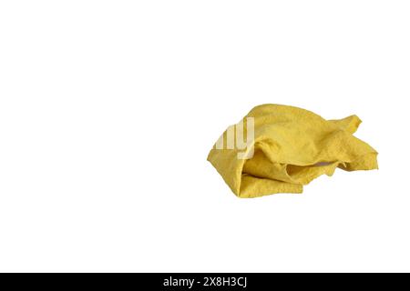 Un panno in microfibra giallo deformato e sporco. Foto Stock