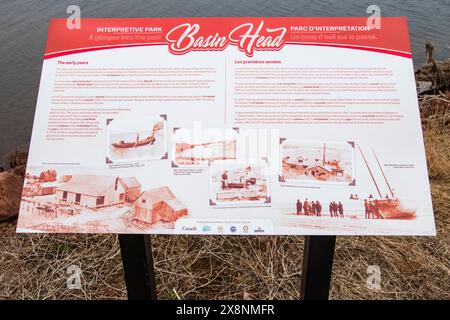 Basin Head Provincial Park: Uno sguardo interpretativo sul cartello passato a Kingsboro, Prince Edward Island, Canada Foto Stock