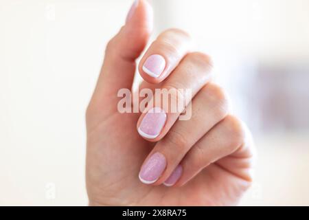 Un colpo della mano della bella donna. Foto Stock