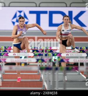 Abigail Pawlett, Gran Bretagna, e Noor Vidts, Belgio, gareggiano nel pentathlon da 60 m ai Campionati mondiali di atletica indoor, Emirato Foto Stock