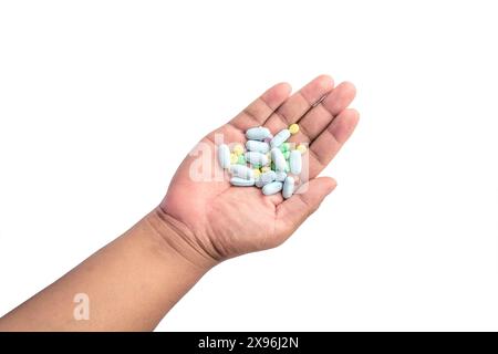 Compresse pillole cumulo colore mix medicina medico a portata di mano Foto Stock