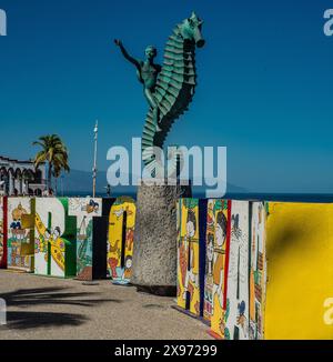 Ragazzo su un cavalluccio marino, Malecon, Puerto Vallarta Jalisco Foto Stock