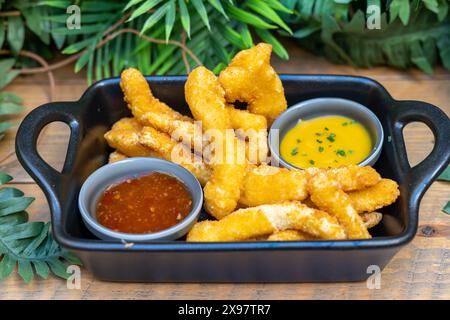 Porzione di patate fritte o patate dolci per accompagnare il menu Foto Stock